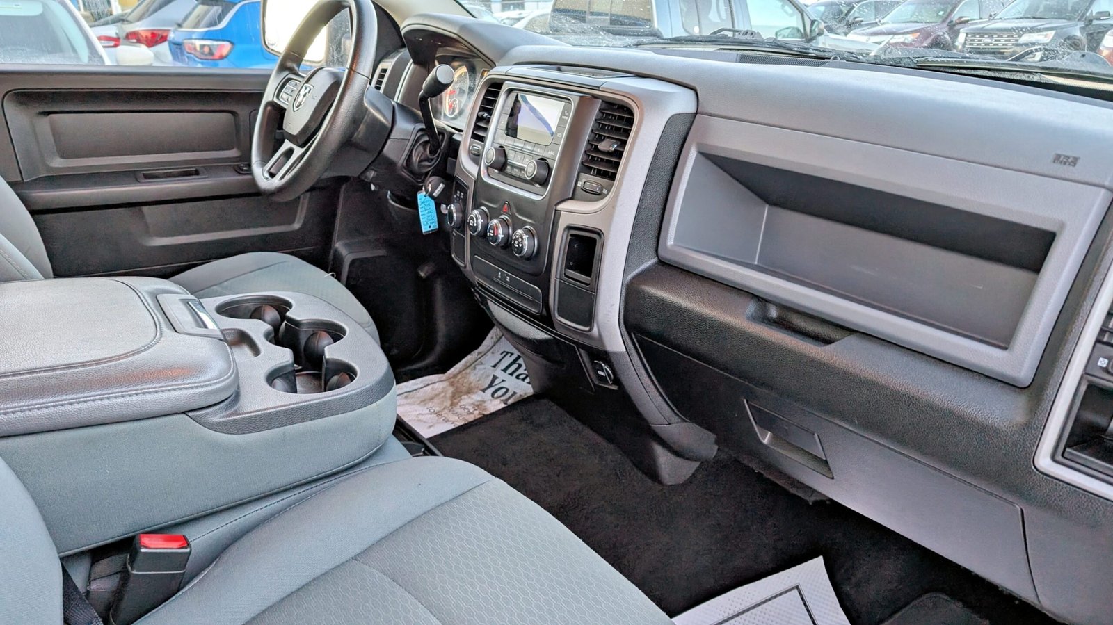 2015 Ram 1500 4WD Crew Cab 140.5″ ST