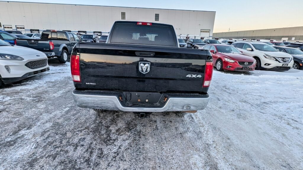 2015 Ram 1500 4WD Crew Cab 140.5″ ST