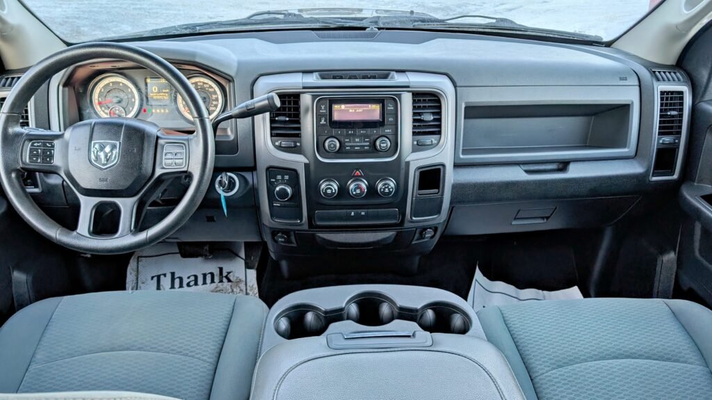 2015 Ram 1500 4WD Crew Cab 140.5″ ST