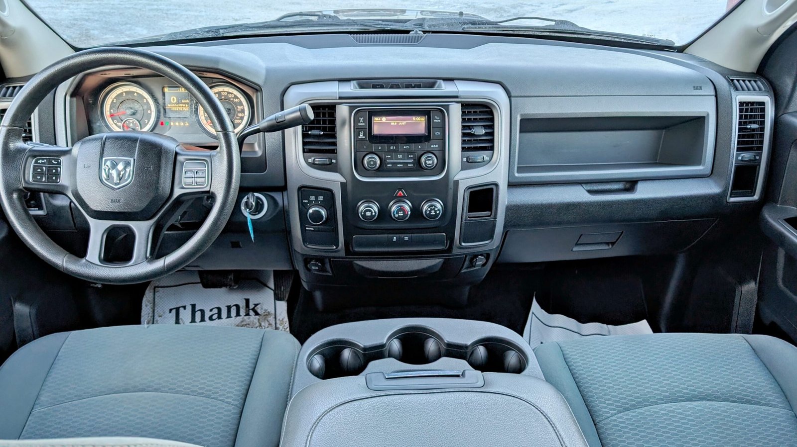 2015 Ram 1500 4WD Crew Cab 140.5″ ST