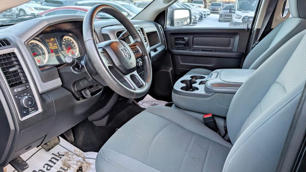 2015 Ram 1500 4WD Crew Cab 140.5″ ST